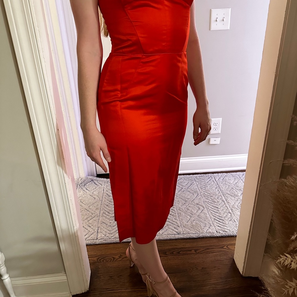 ReemAcra Red bow front strapless satin red dress with slit in the back.Worn once